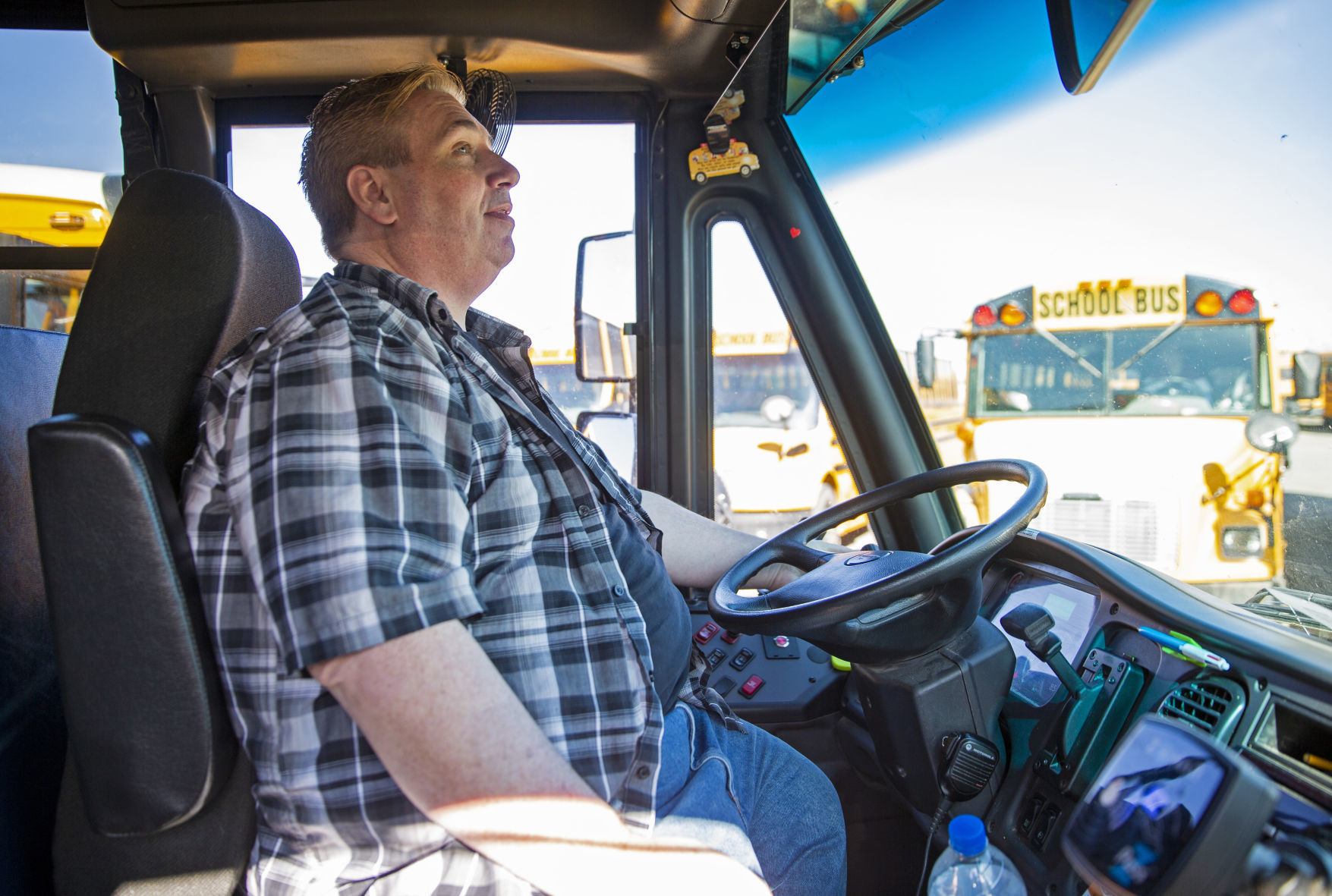 Bus drivers deliver food to students